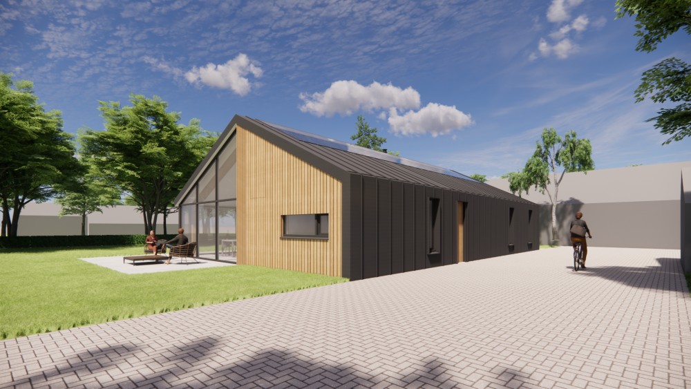 Afbeelding van Schuurwoning met houten gevel en donker felsplaten zadeldak - 581e5484-71c2-406f-92f6-f5e5f79a14bd